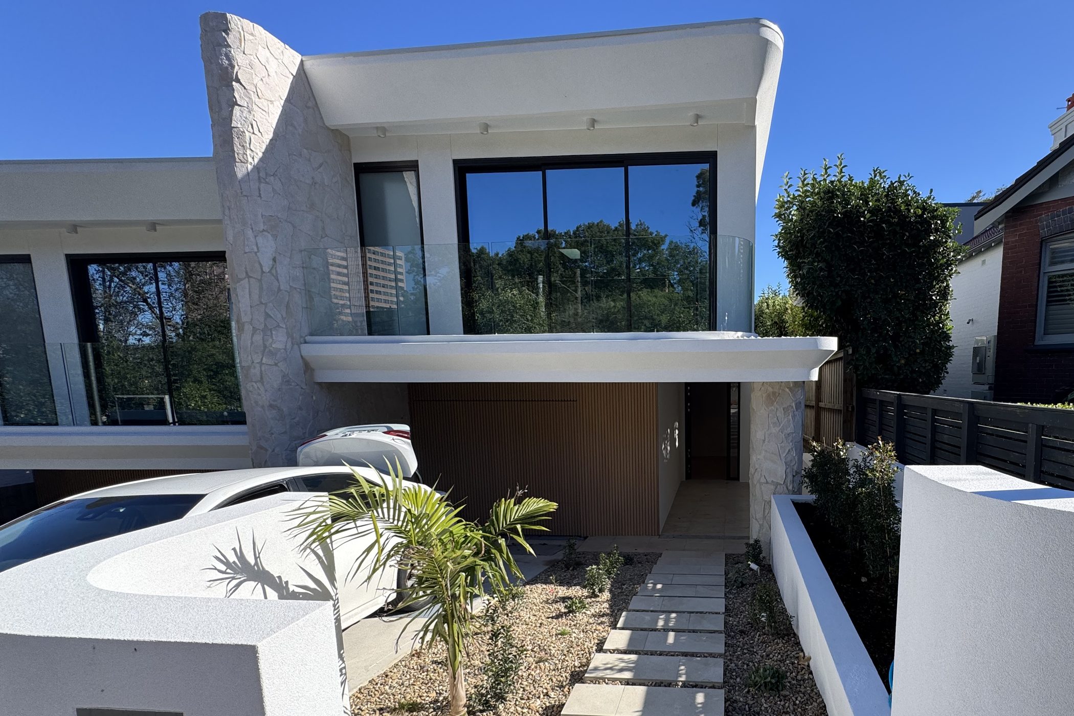 The finished home on the same block, seen from the footpath.